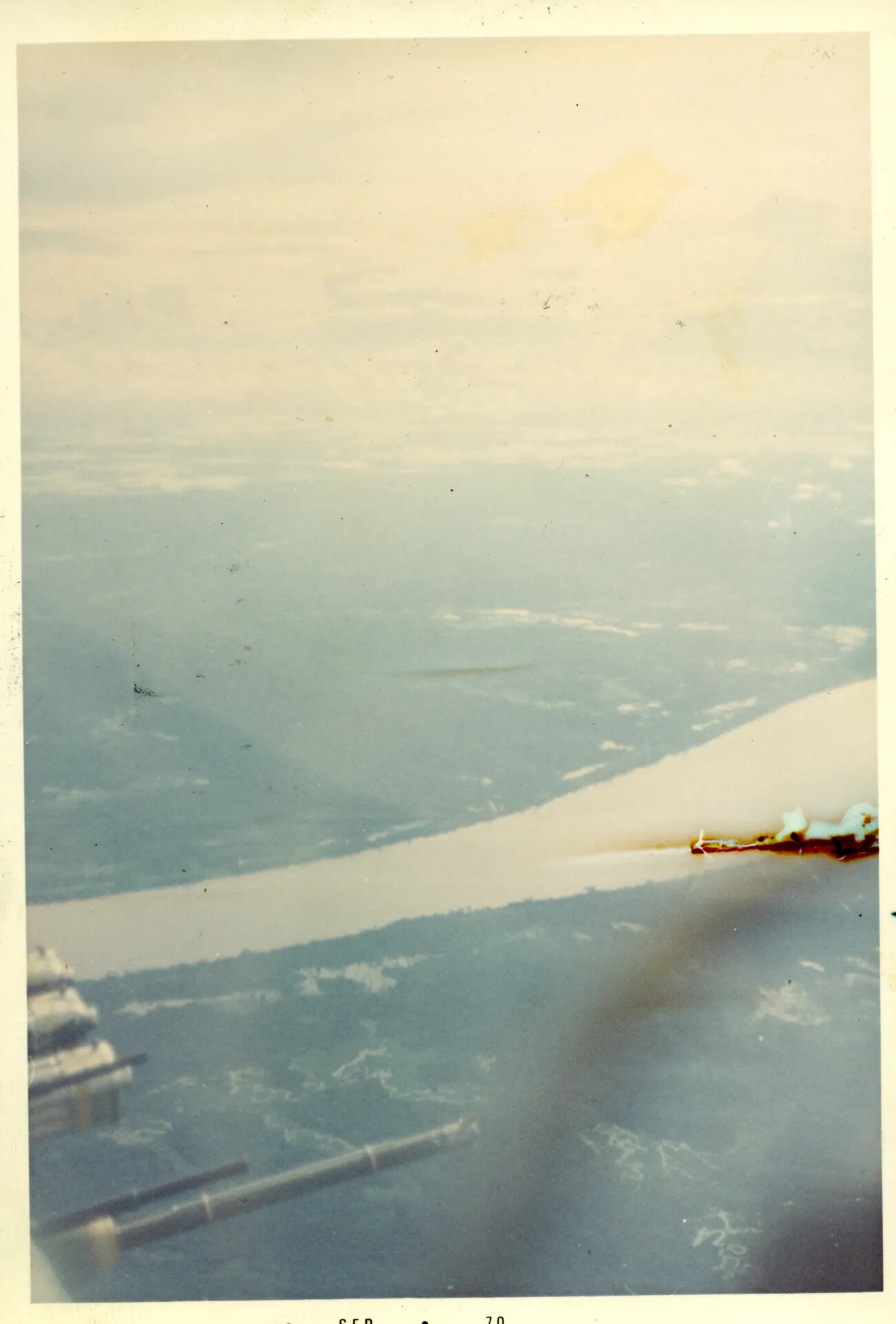 In-Flight View from Aircraft Wing Over Southeast Asia, September 1970