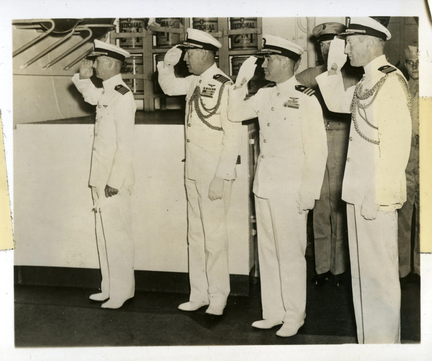U.S. Navy Officers Saluting During Ceremony Aboard USS Franklin D. Roosevelt (CVB-42)