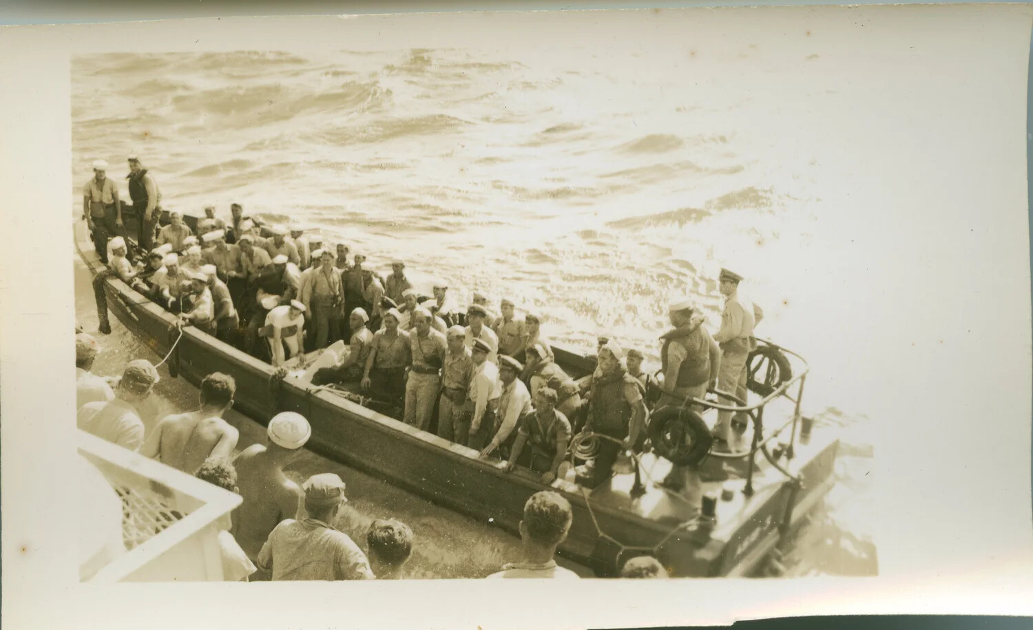 U.S. Navy Prize Crew Boat Alongside Ship, Possibly Departing USS Proteus for Japanese Submarine Surrender, 1945