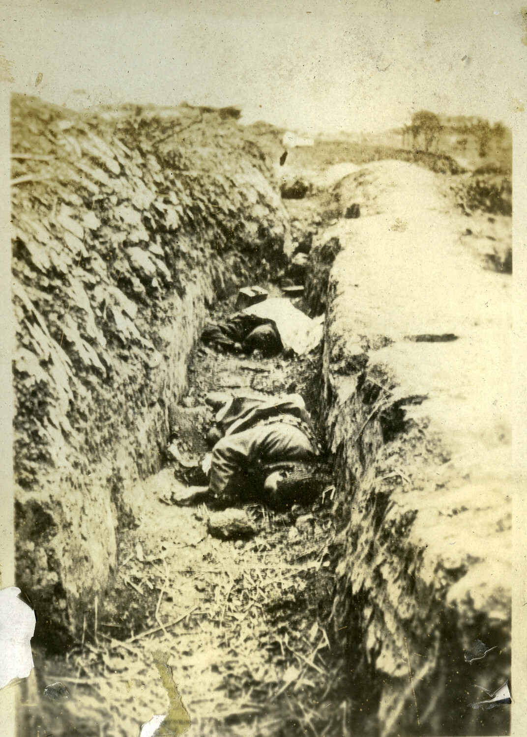 Casualties in a Field Trench, Manila Area, Philippines (Philippine-American War or WWII Battle of Manila era)