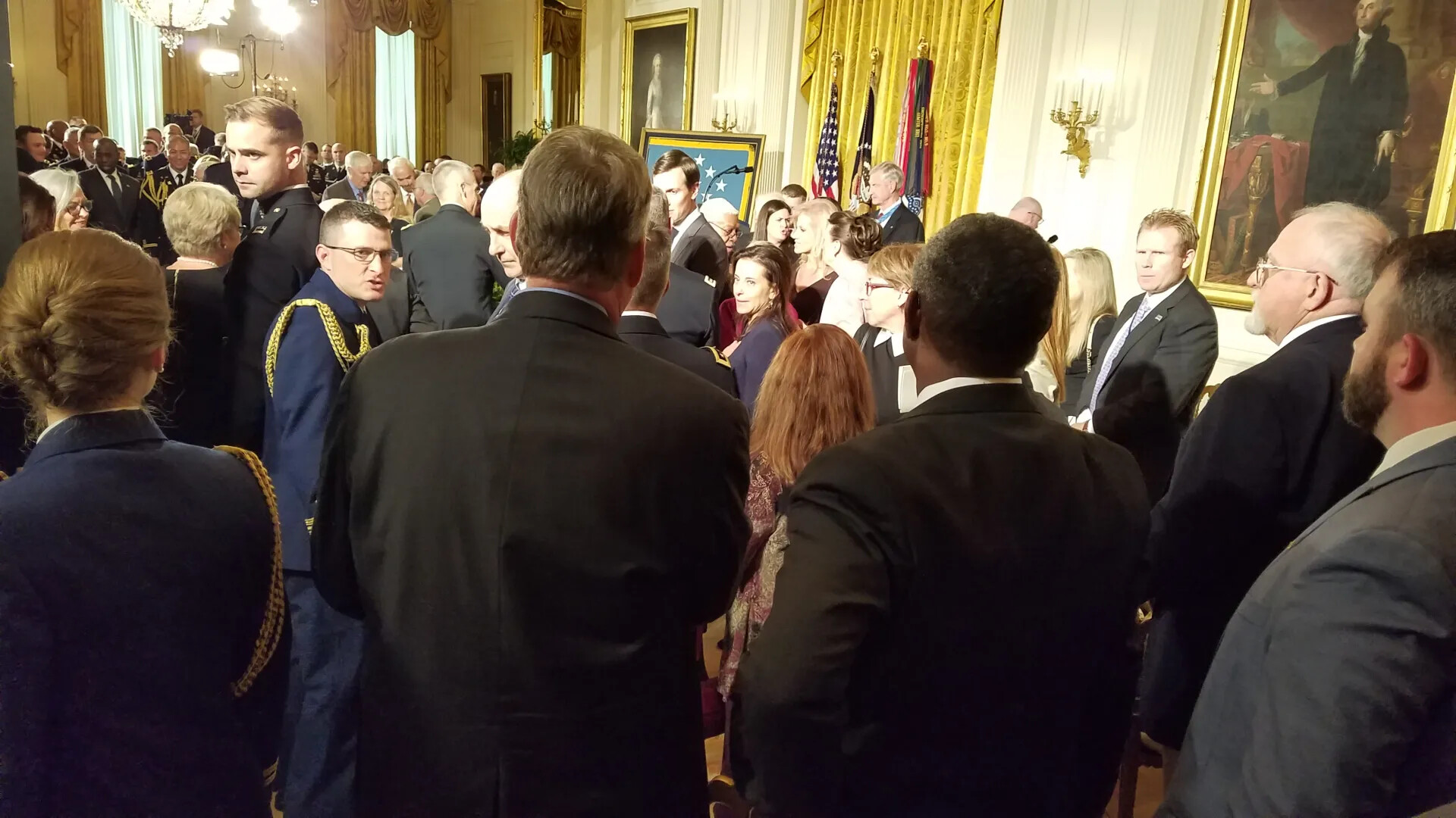 Crowd Gathered in White House East Room Before Medal of Honor Ceremony for Gary Michael Rose, October 23, 2017