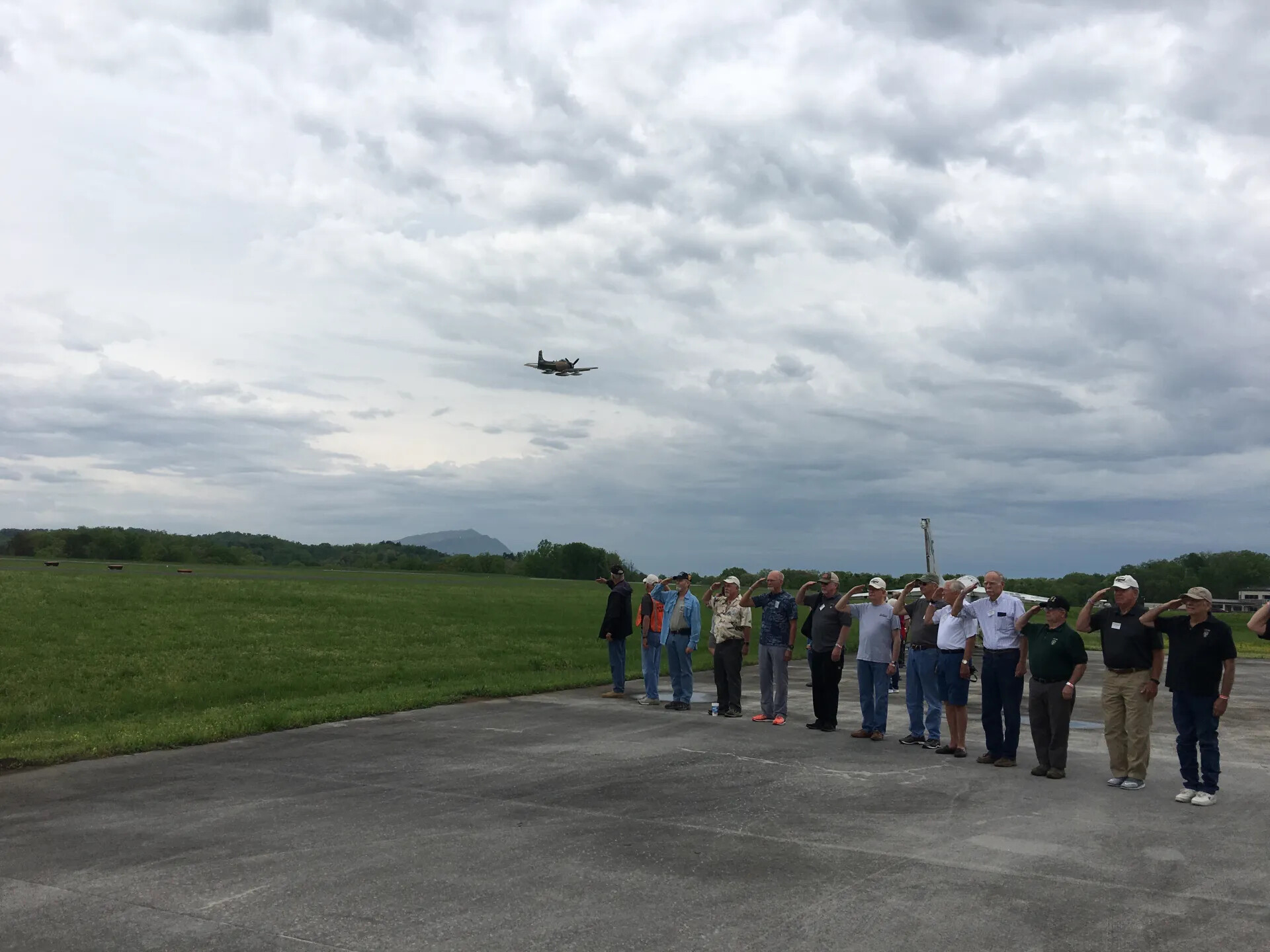 Veterans Salute A-1 Skyraider Flyover During 'Mel Swanson Day' Tribute Event