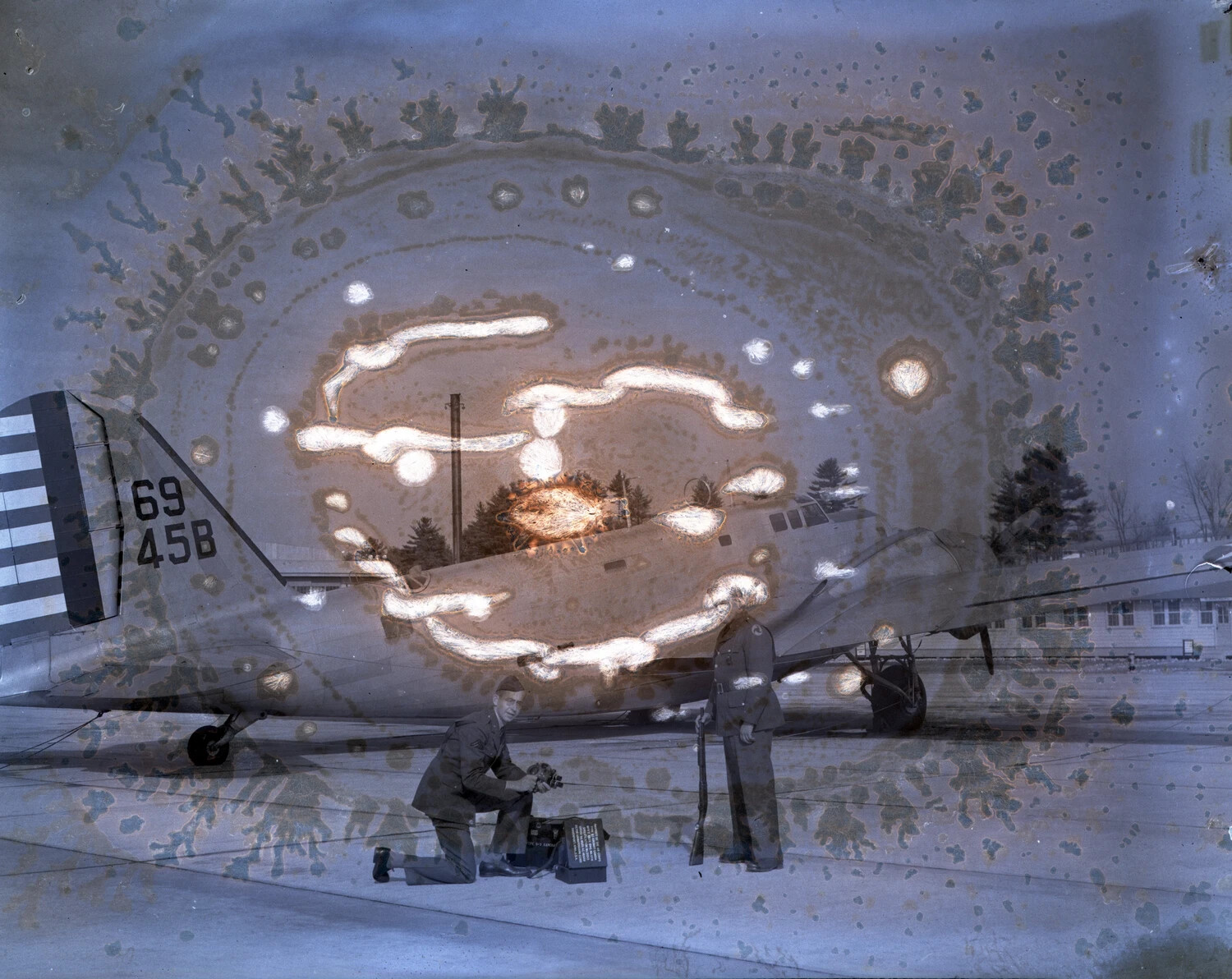 Damaged Negative - Twin-Engine Trainer Aircraft with Ground Crew
