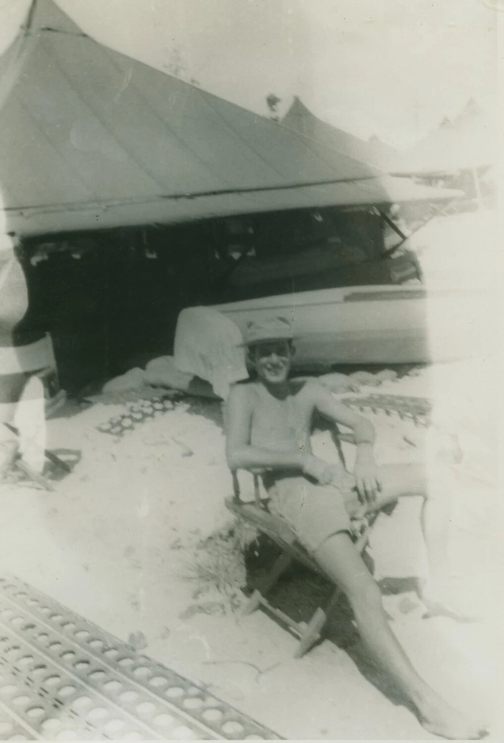 Serviceman Relaxing in Beach Chair Outside Tent, Pacific Theater Camp, WWII