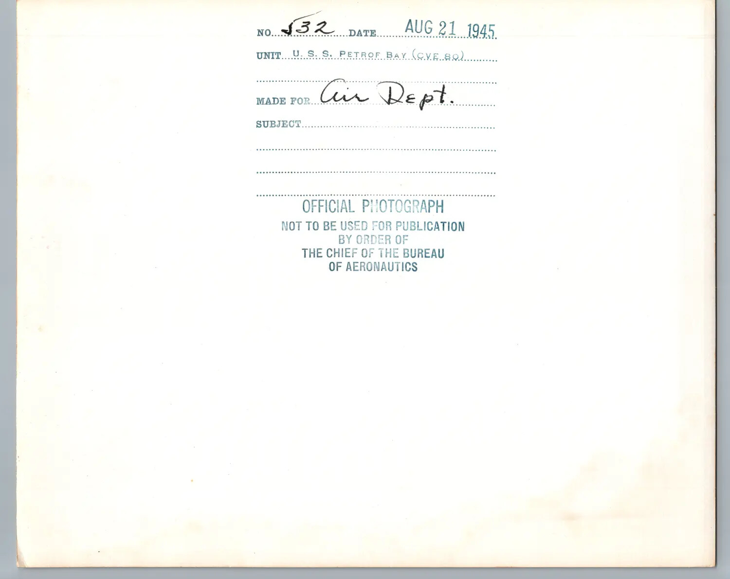 Verso Caption Card of Official U.S. Navy Photograph No. 532, U.S.S. Petrof Bay (CVE-80), August 21, 1945