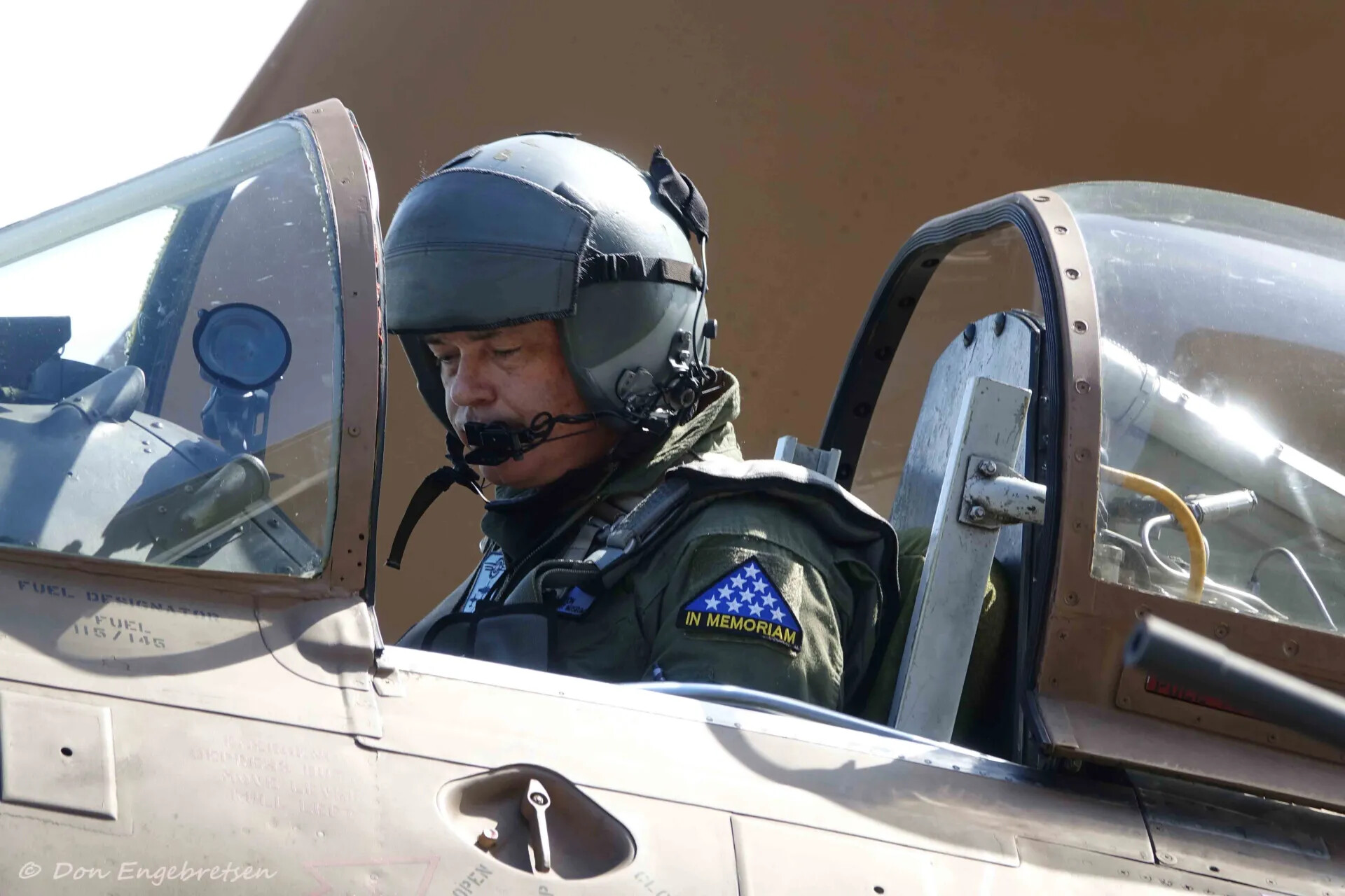 Warbird Pilot in Cockpit Wearing 'In Memoriam' Patch, Airshow Event