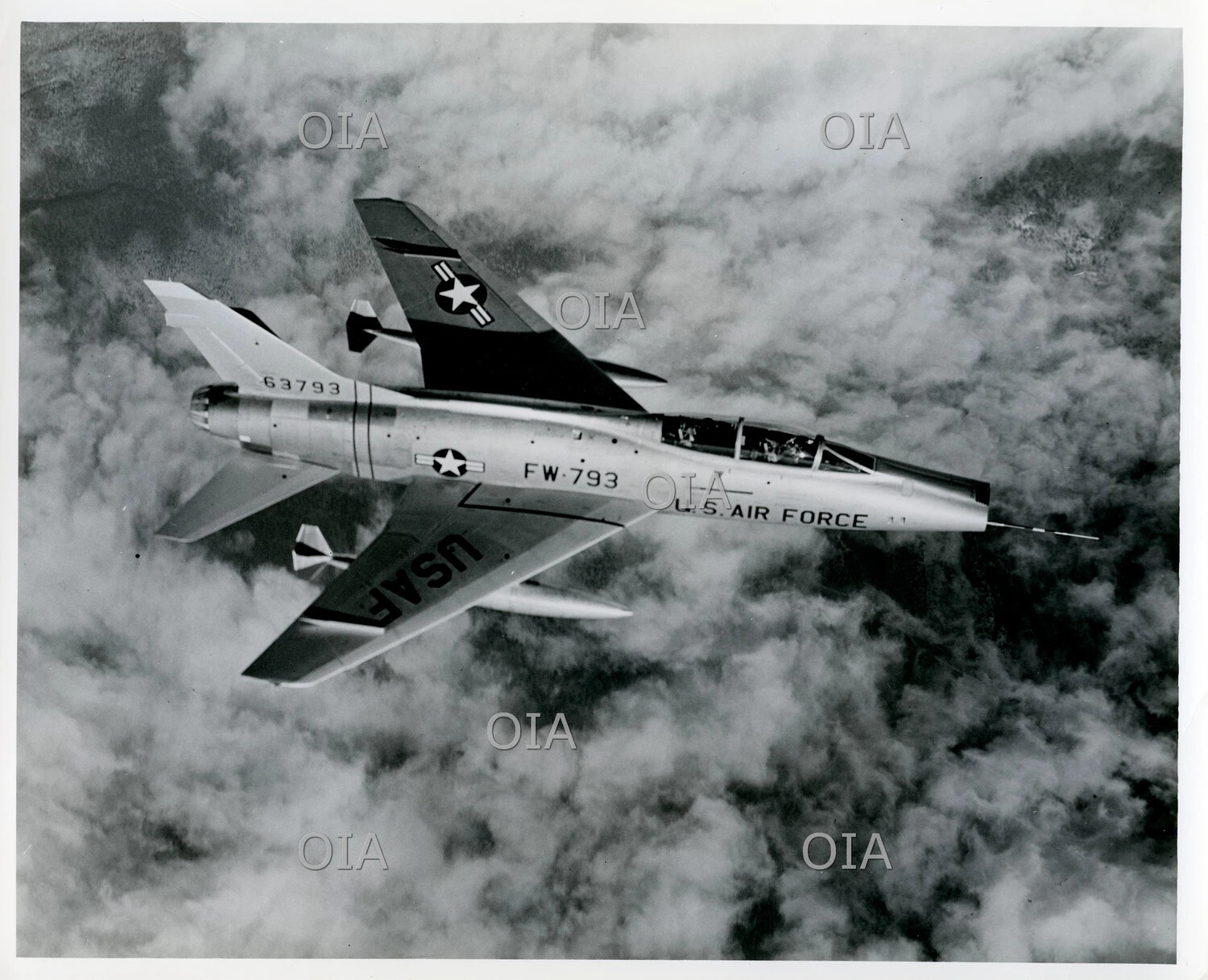 North American F-100 Super Sabre (Serial 63793, Tail Code FW-793) in Banking Flight Above Cloud Cover