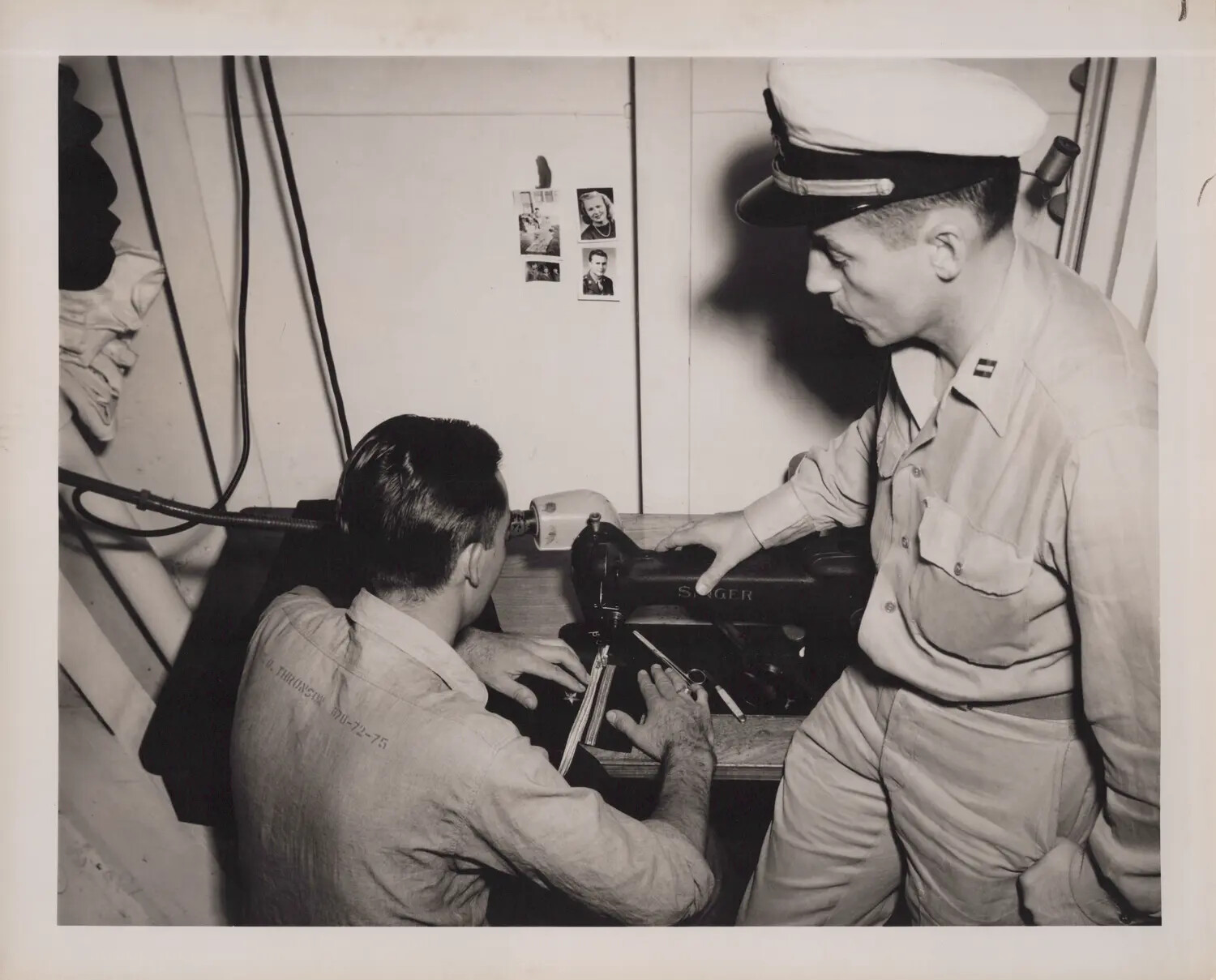 Sailor Sewing Rating Badge at Shipboard Tailor Station, WWII Era