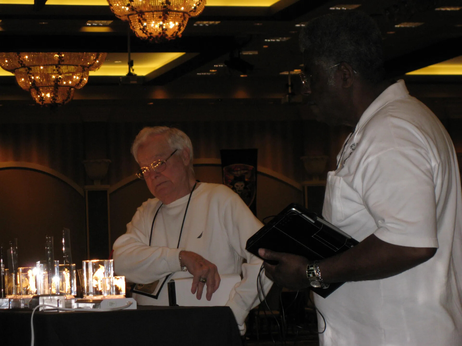 Exhibitor and Attendee at the Laser-Etched Crystal Display Table, SOAR XXXVII, Las Vegas, 2013