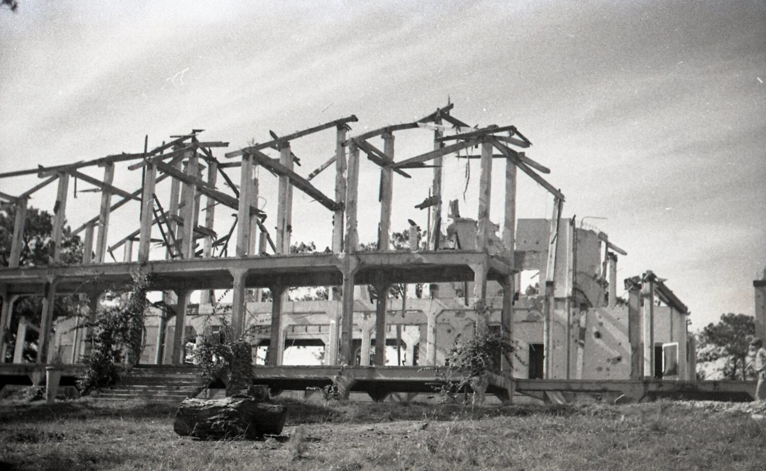 War-Damaged Concrete Building with Exposed Roof Trusses, Luzon, Philippines, WWII