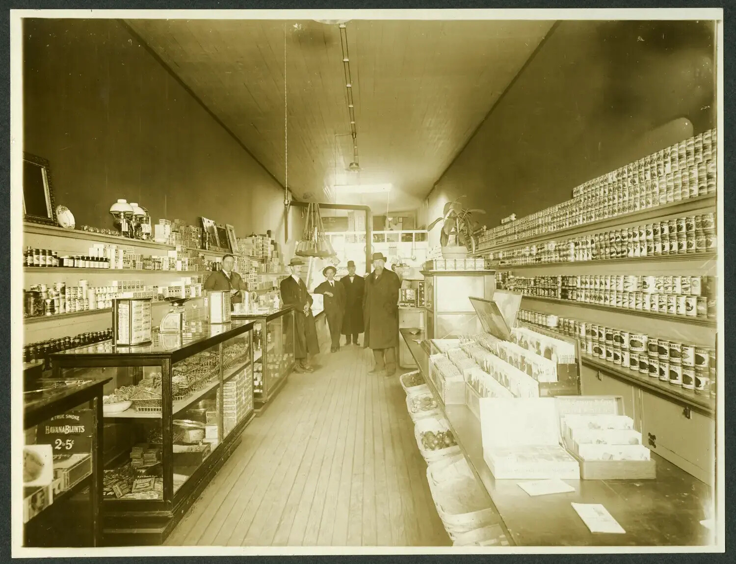 Early 20th-Century General Store Interior with Proprietors and Staff (Misfiled Non-Vietnam Image)