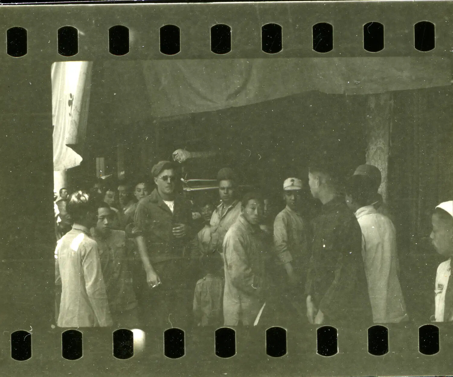 American Serviceman Among Chinese Civilians in Marketplace Scene - CBI Theater