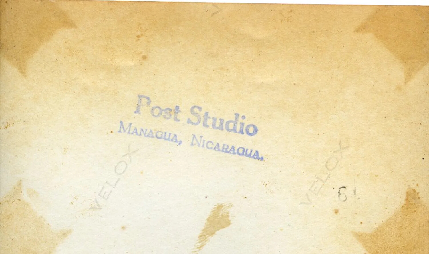 Verso of Photographic Print with Velox Watermark and 'Post Studio, Managua, Nicaragua' Stamp