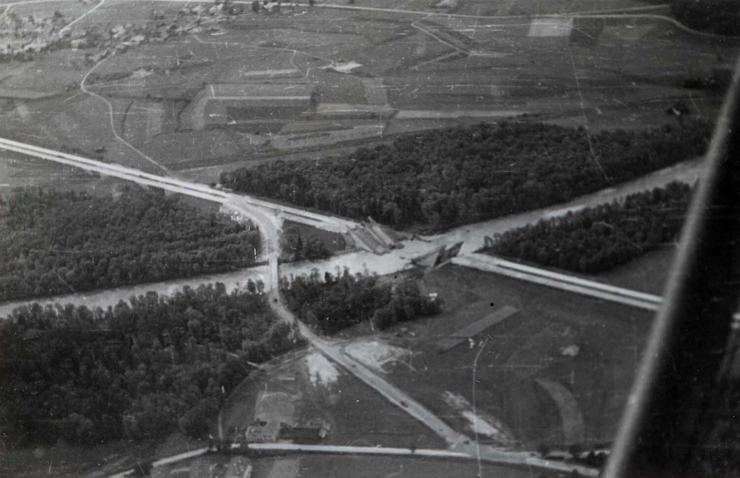 Aerial View of Demolished Autobahn Bridge over Waterway, Germany, WWII