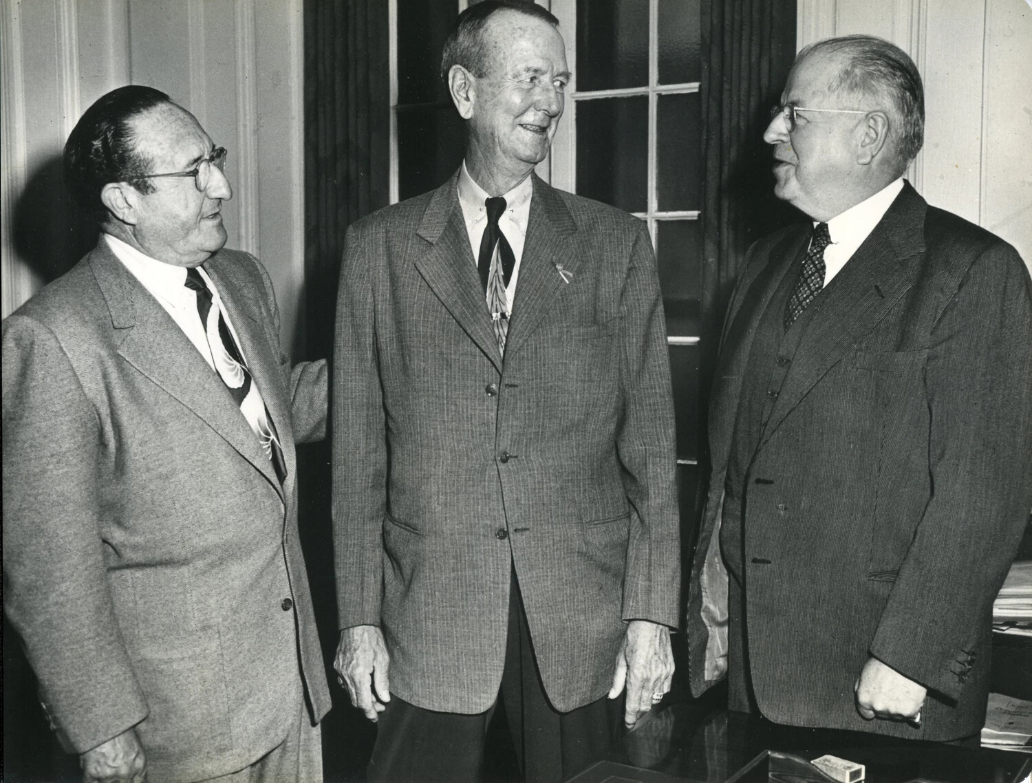 General Jonathan M. Wainwright IV in Civilian Dress with Two Men, Office Setting, Second Album Variant, c. 1949