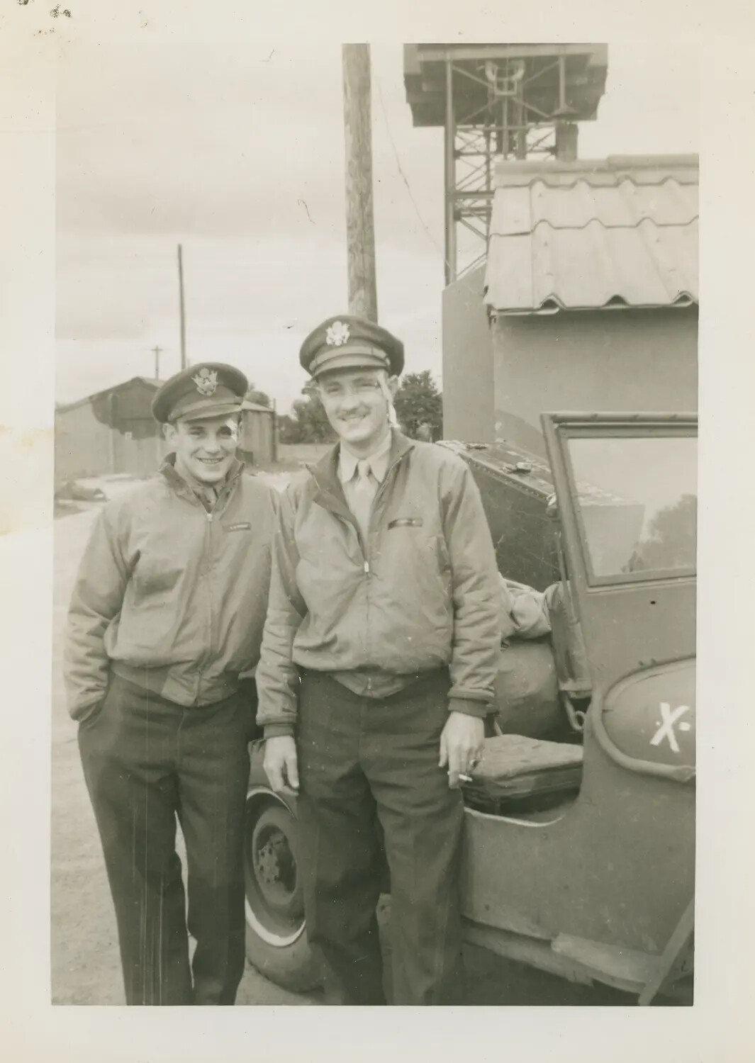 Two USAAF Officers Beside a Jeep at Wendling Airfield, Including Lt. J.D. Connolly, Navigator