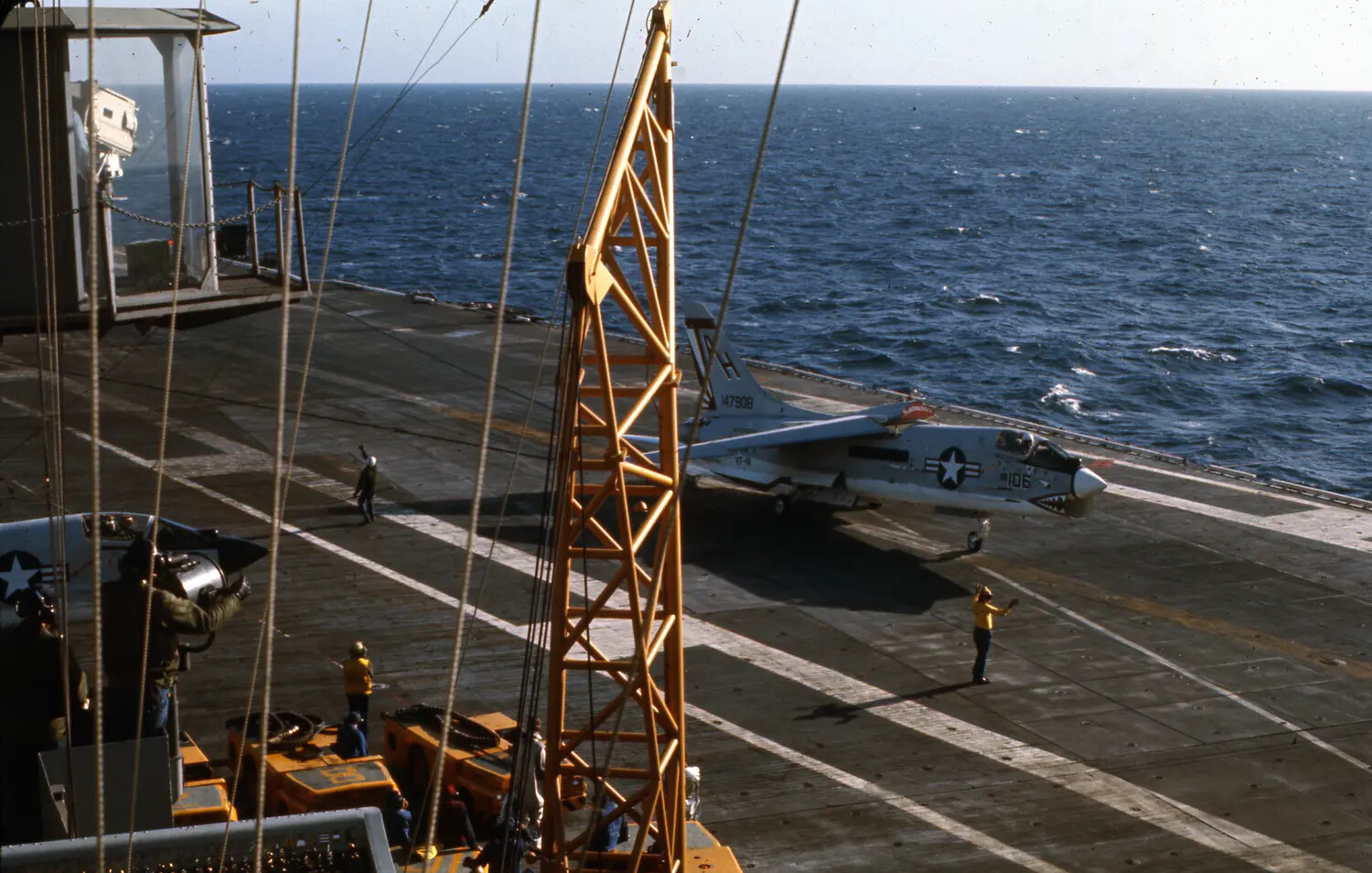F-8 Crusader Fighter (BuNo 147908, Side Number 106) Taxiing on USS Ticonderoga Flight Deck