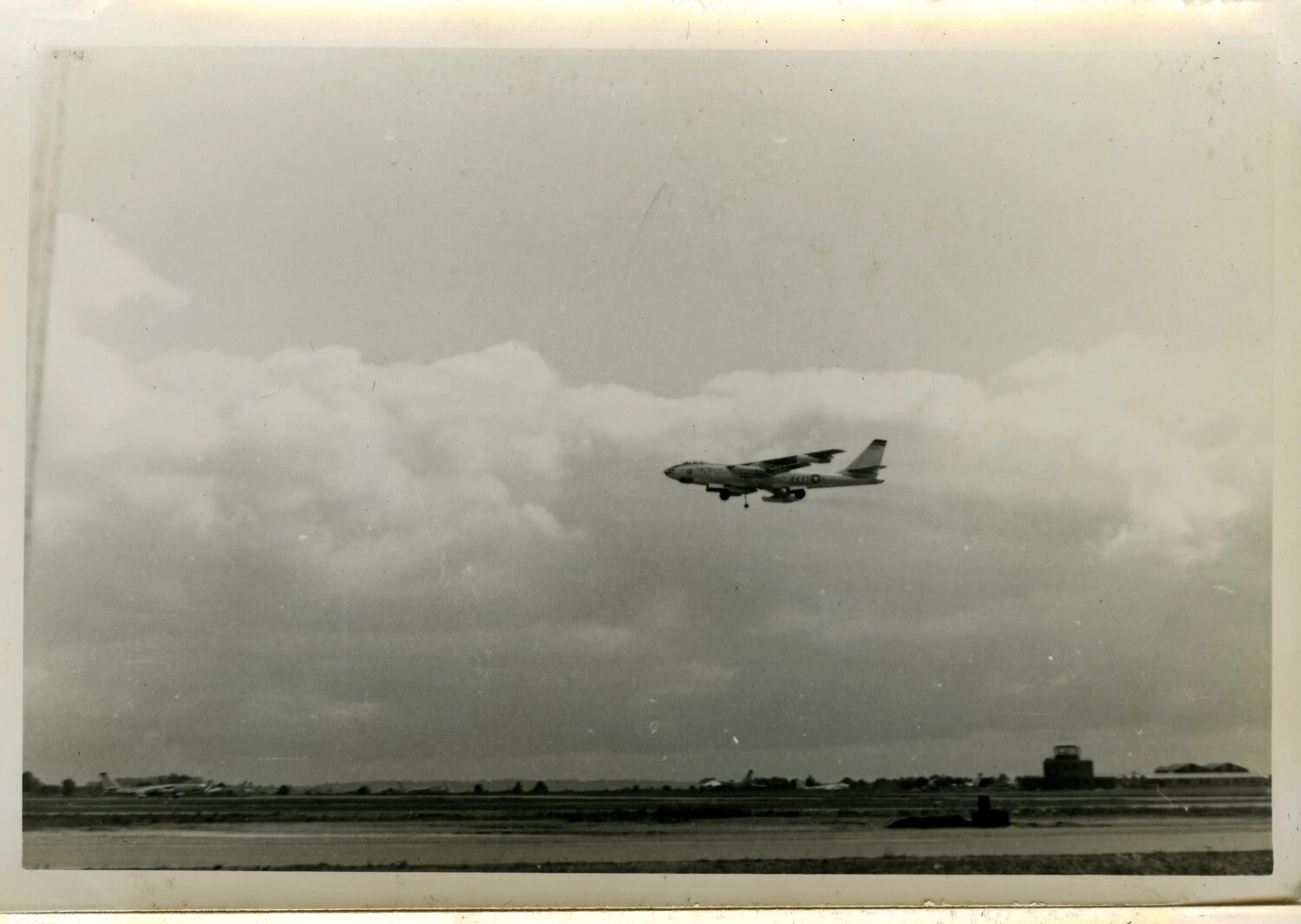 Boeing B-47 Stratojet in Flight Near Airfield Control Tower - 'Last Resort' Collection