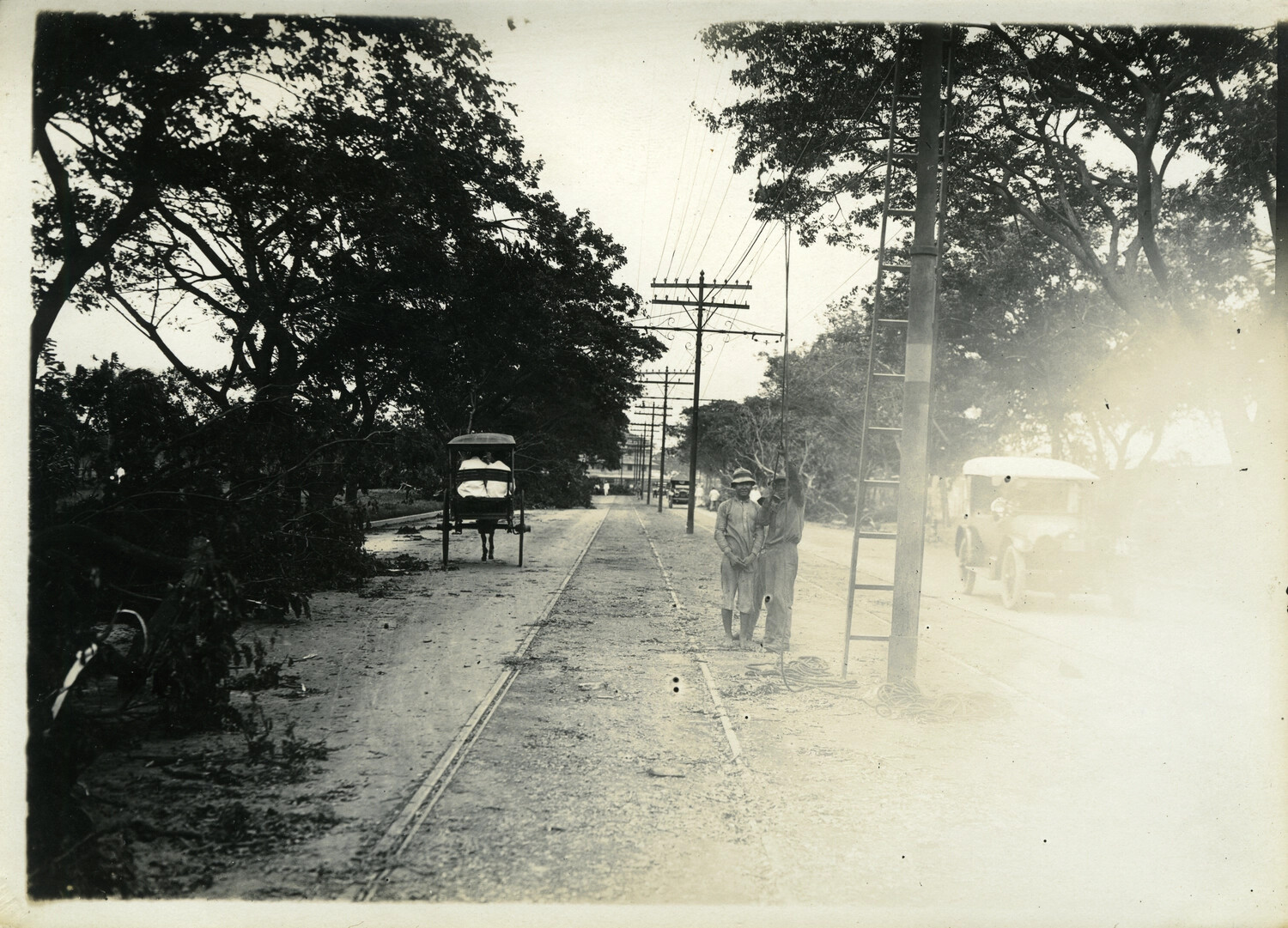 Storm-Damaged Boulevard with Utility Repair Crew, Manila, Philippines, Early 1900s