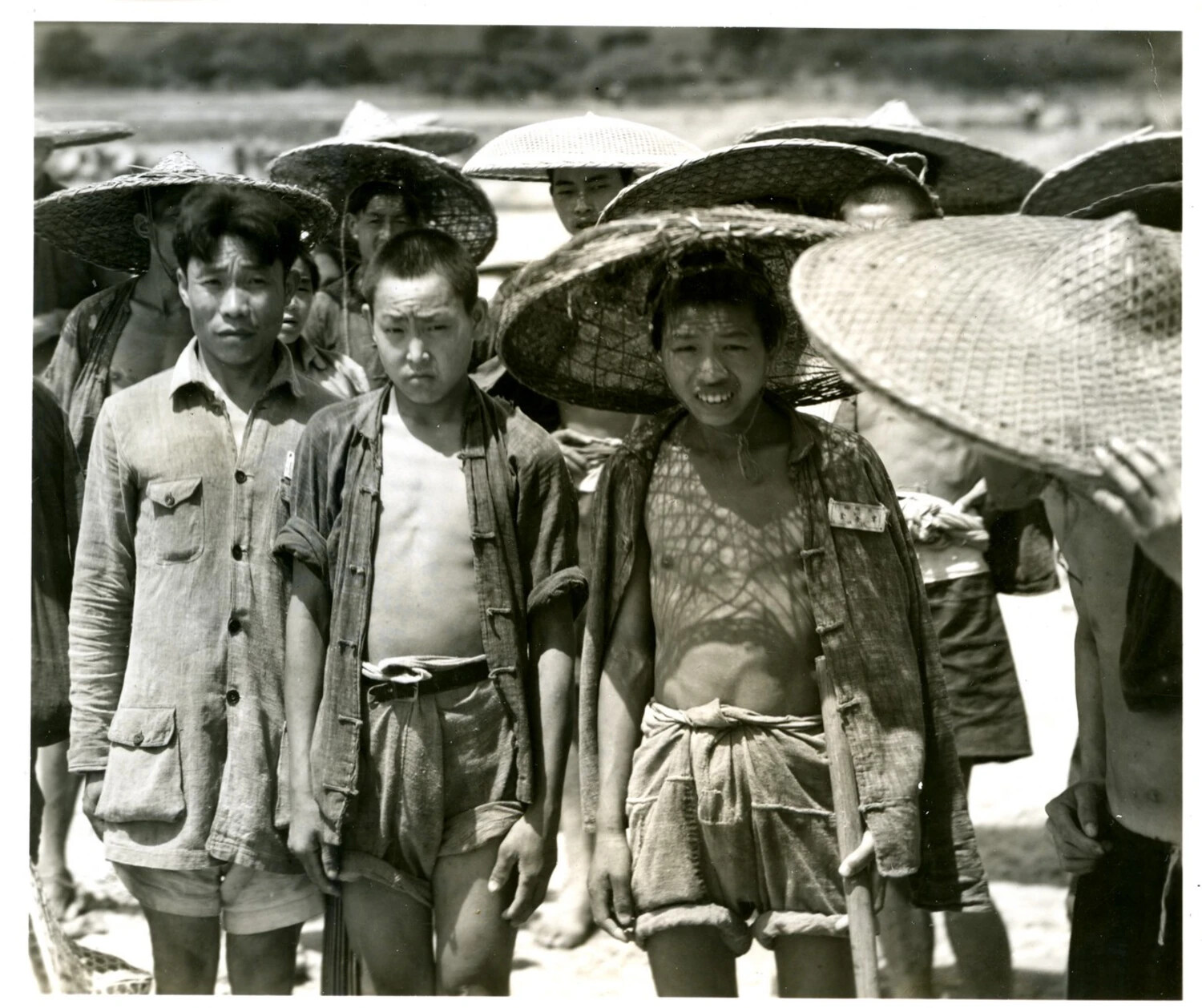 Group of Local Laborers with Conical Hats, China-Burma-India Theater, WWII Era