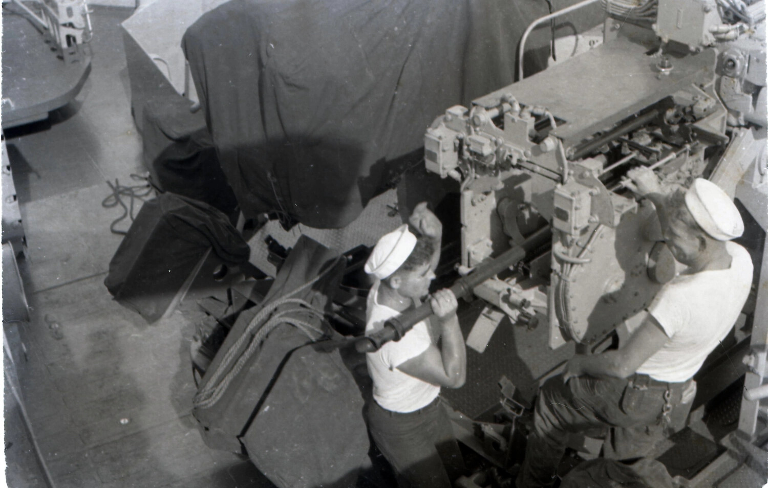Sailors Servicing Anti-Aircraft Gun Mount Aboard USS Yorktown (CV-10), 1953