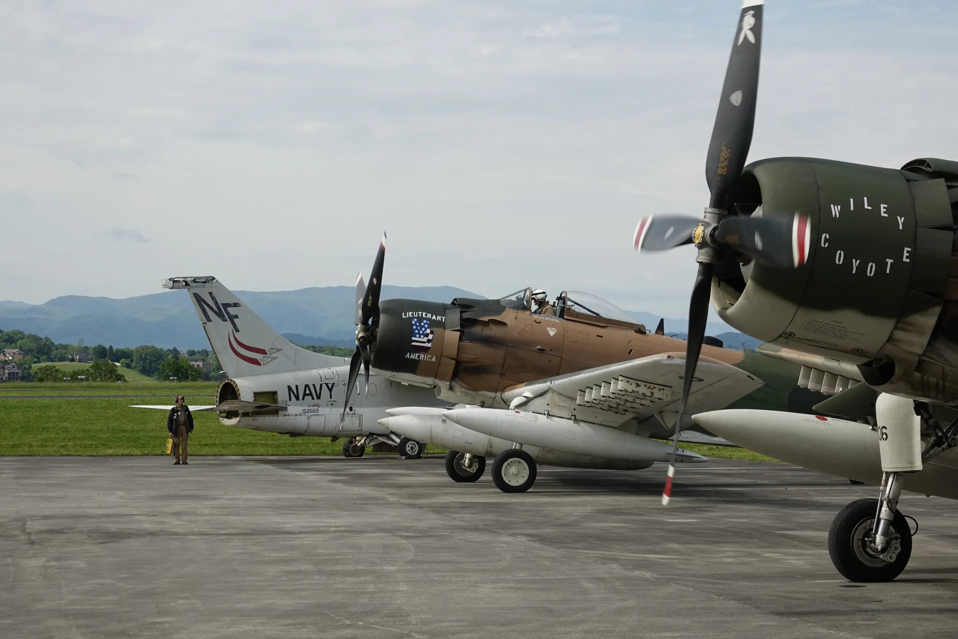 Two Restored A-1 Skyraiders "Wiley Coyote" and "Lieutenant America" on Ramp
