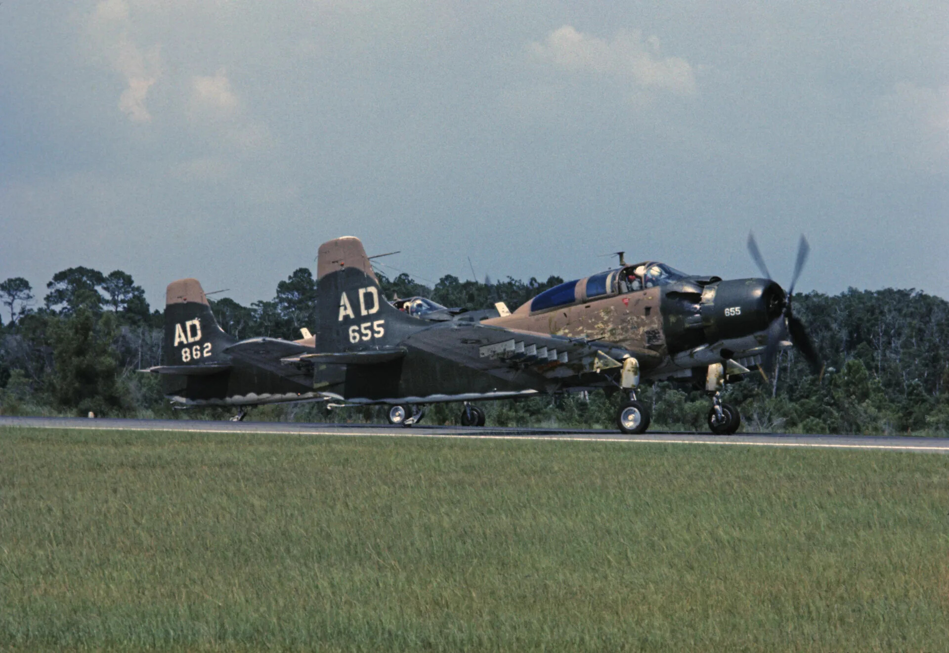 Two A-1 Skyraiders ("AD 655" and "AD 862") Taxiing at a Stateside Training Base