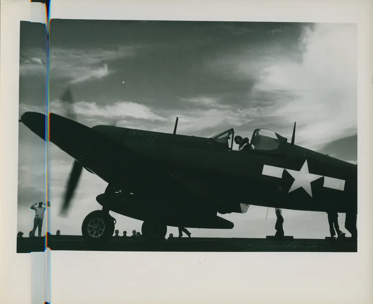 Carrier Fighter Aircraft Silhouetted on Flight Deck, USS Petrof Bay (CVE-80)