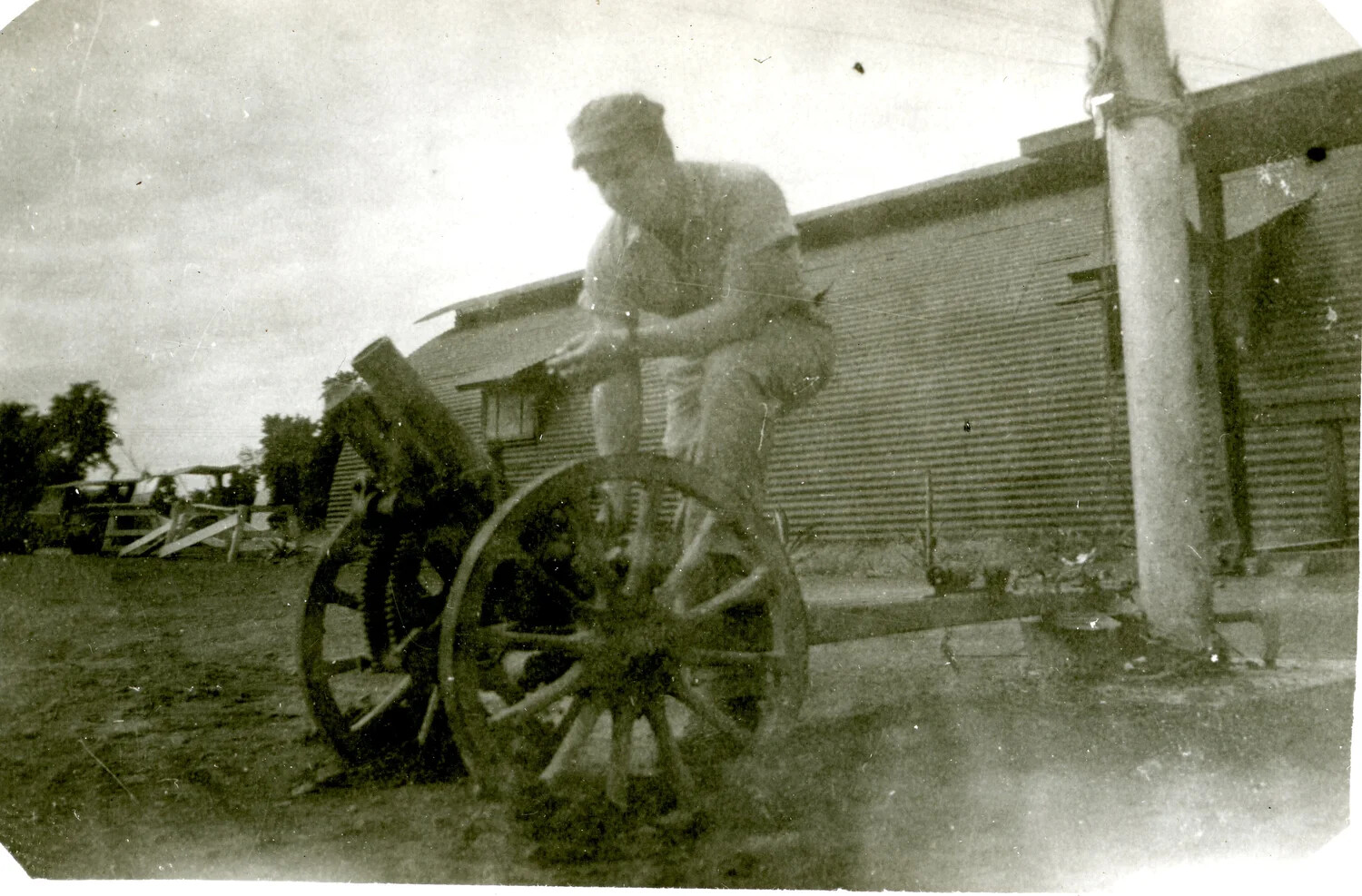 U.S. Marine Examining a Captured Japanese Field Gun, Iwo Jima, 1945