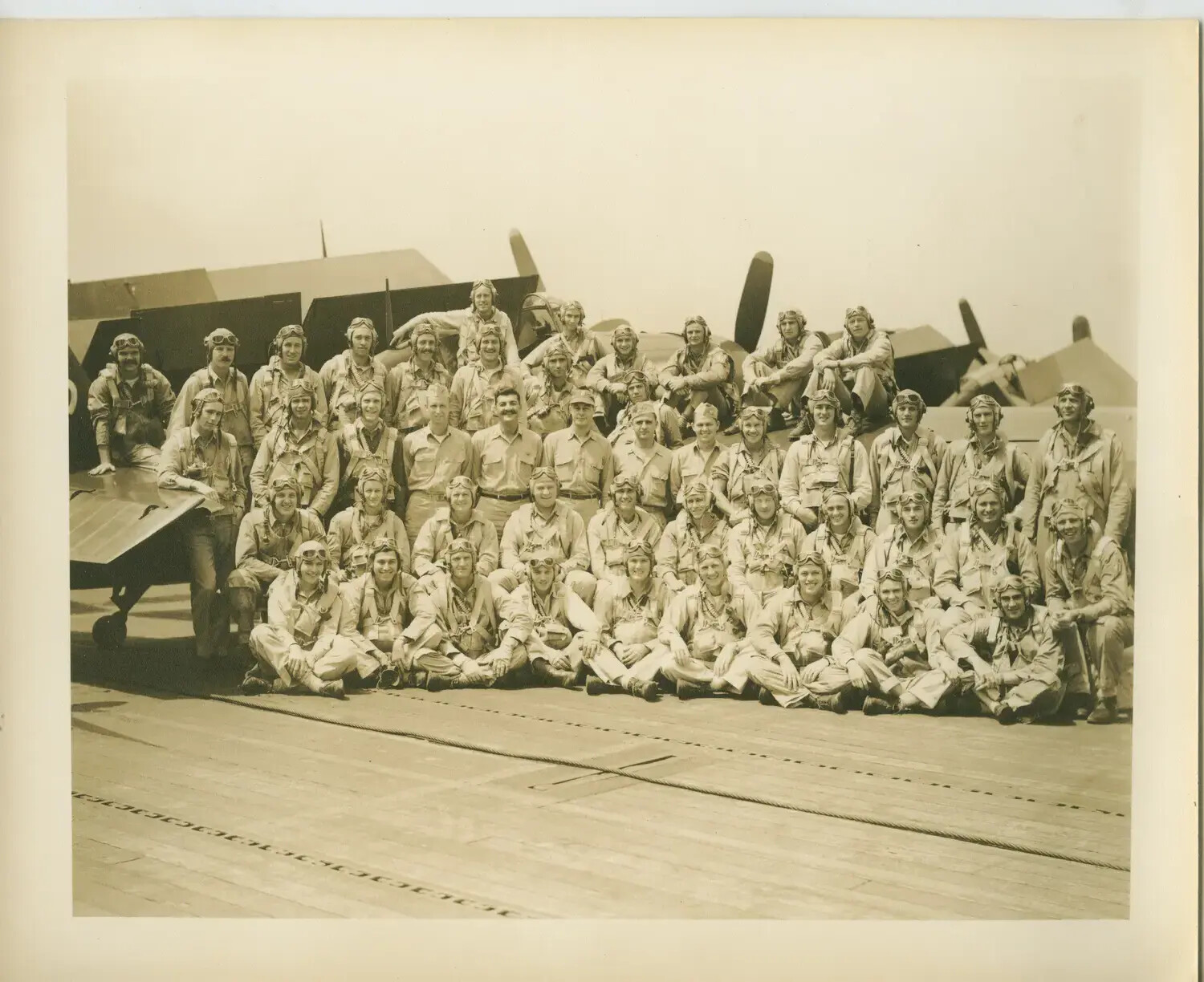 Squadron Group Portrait on Flight Deck, USS Petrof Bay (CVE-80)