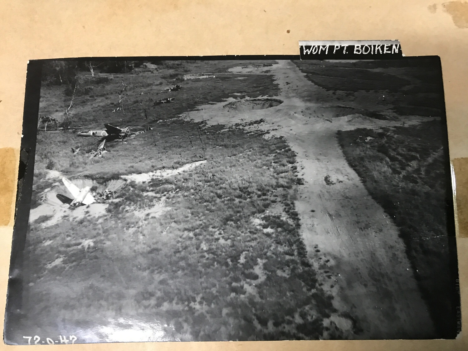 Destroyed Japanese Aircraft with Visible Hinomaru Marking, Wom Point, Boiken, New Guinea (Print No. 72-0-42)
