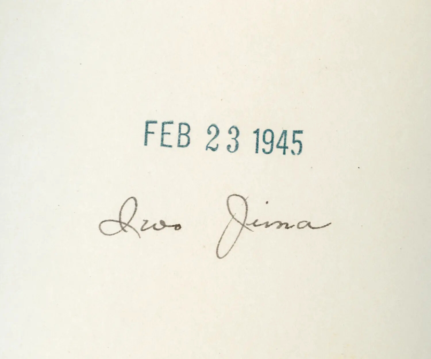 Photo Caption Card: 'Iwo Jima,' Dated February 23, 1945 - USS Petrof Bay (CVE-80) Collection