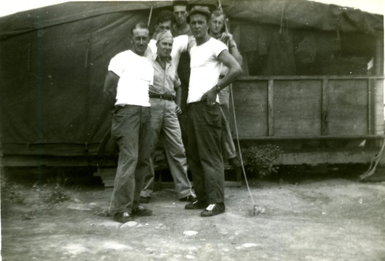 Six U.S. Marines Posed Before Wood-Framed Tent Structure, 5th Marine Division Camp, Pacific Theater, 1945