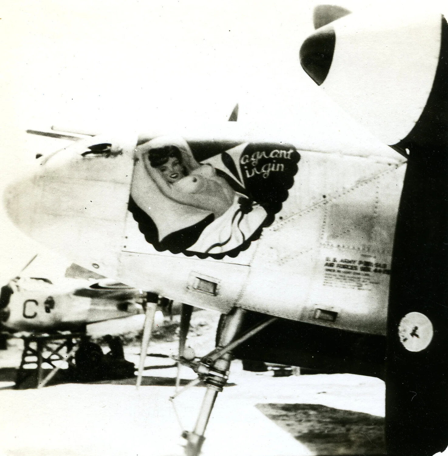 Nose Art ("...Virgin") on B-25 Mitchell, 345th Bombardment Group, Pacific Theater, WWII