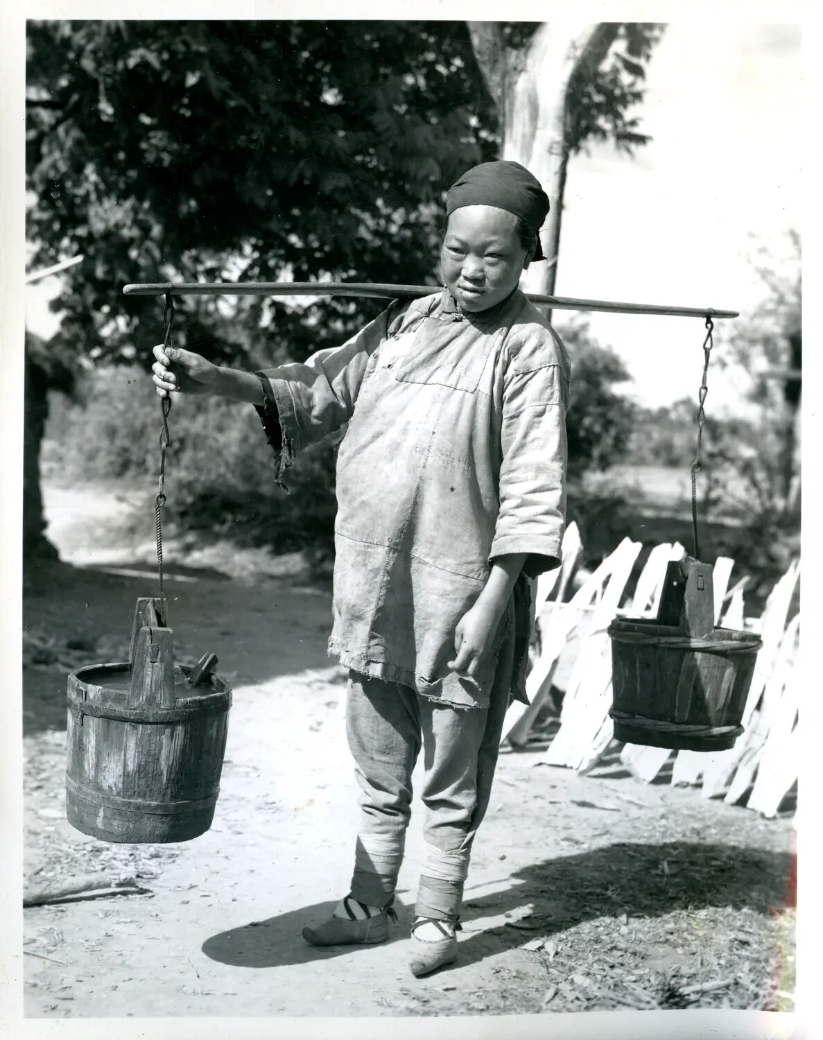 Local Woman Carrying Water Buckets on Shoulder Yoke, China-Burma Theater, WWII Era