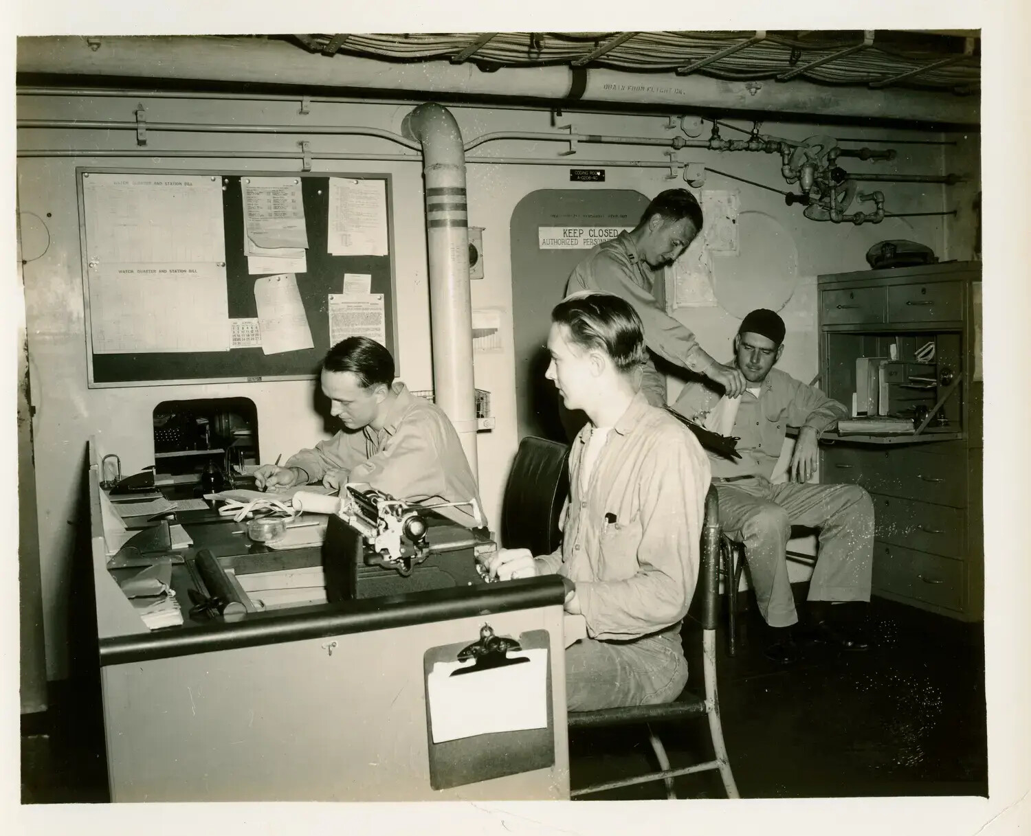 Ship's Office Compartment Aboard USS Petrof Bay (CVE-80), Near the Coding Room