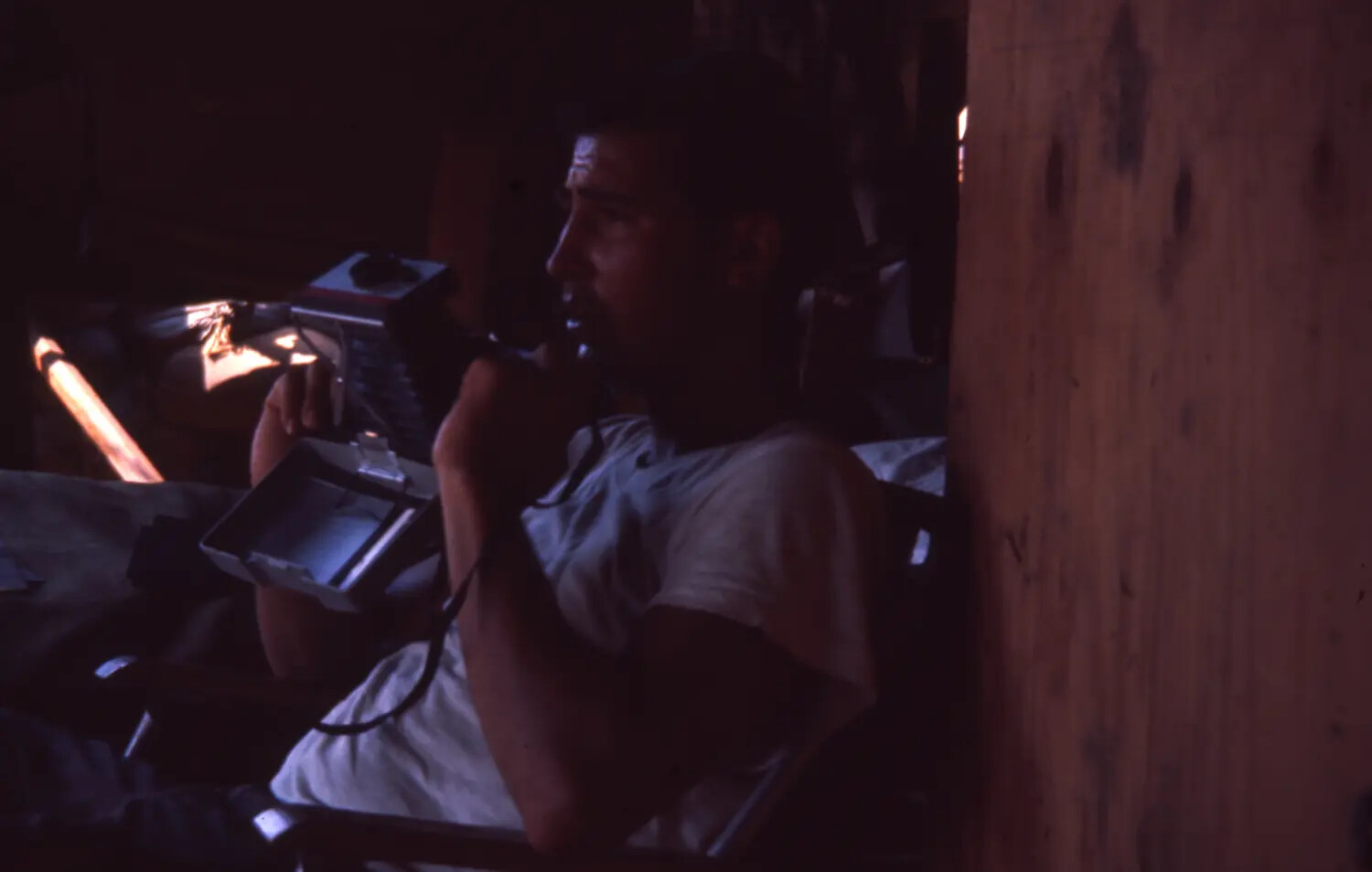Serviceman Using Field Telephone in Hooch, Vietnam (Cam Ranh Bay Collection)