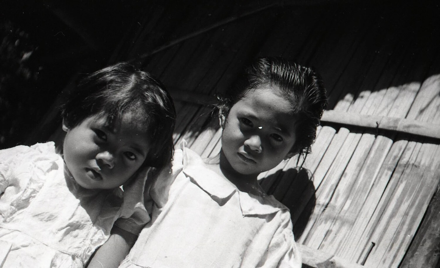 Close Portrait of Two Filipino Sisters, Luzon, Philippines, WWII Era