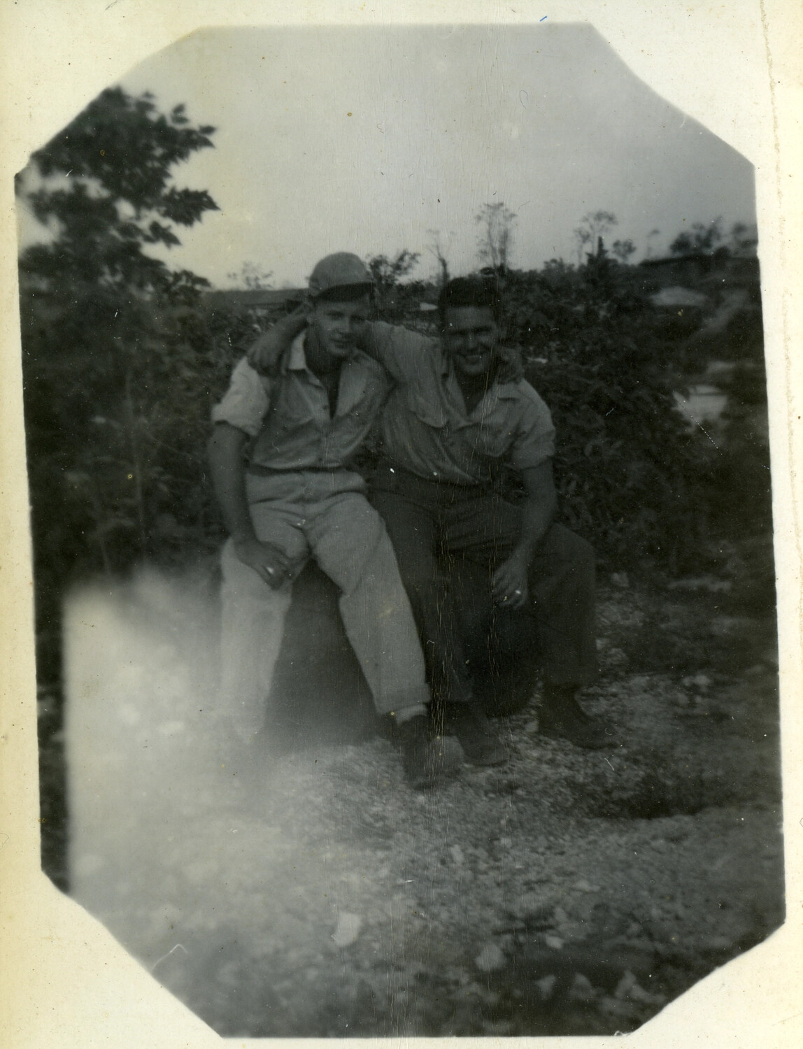 Two American Servicemen Seated Together, Pacific Theater, WWII Era