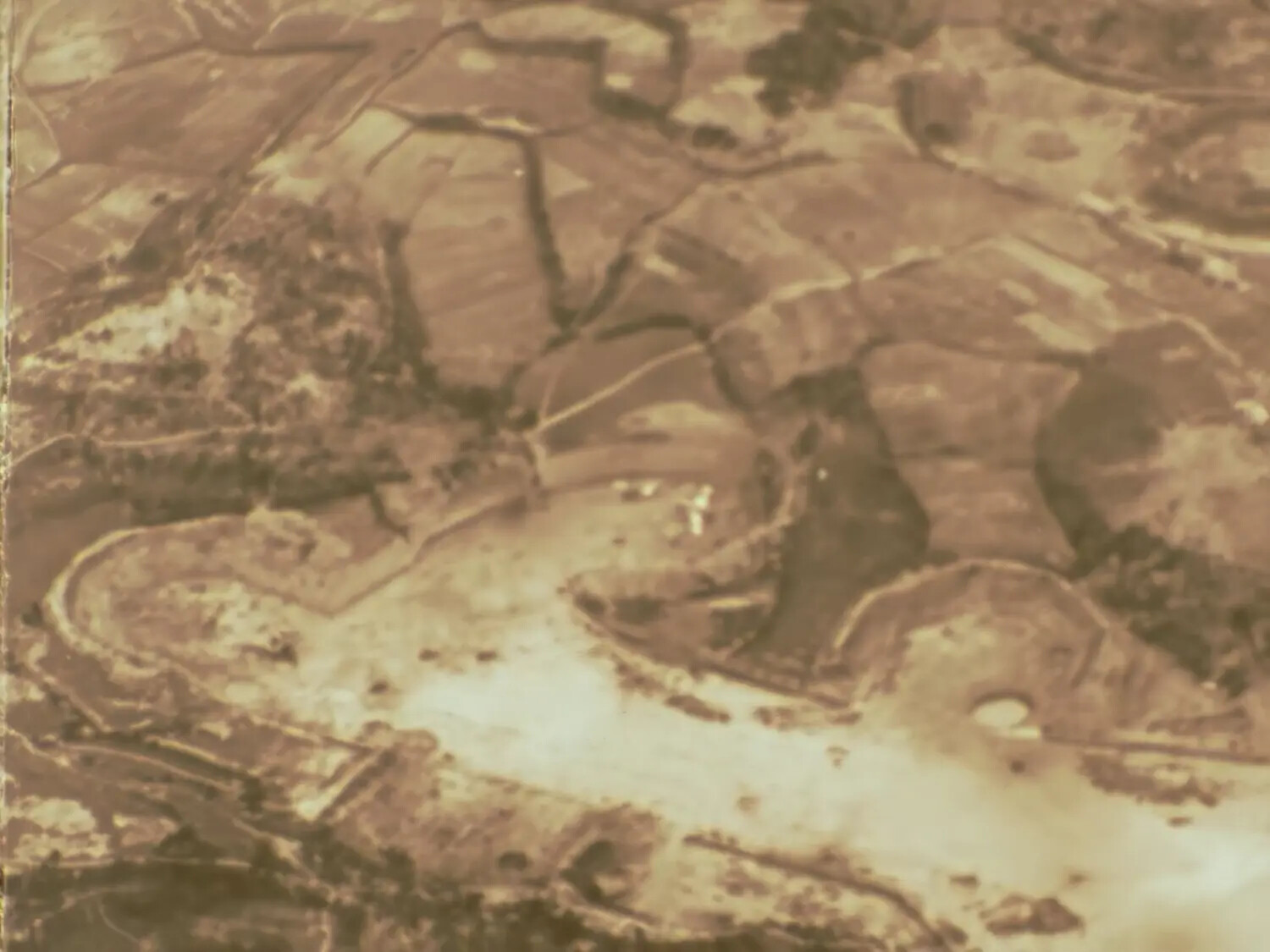 Aerial Reconnaissance Film Still — Cultivated Terrain and River Bend, Pacific Theater