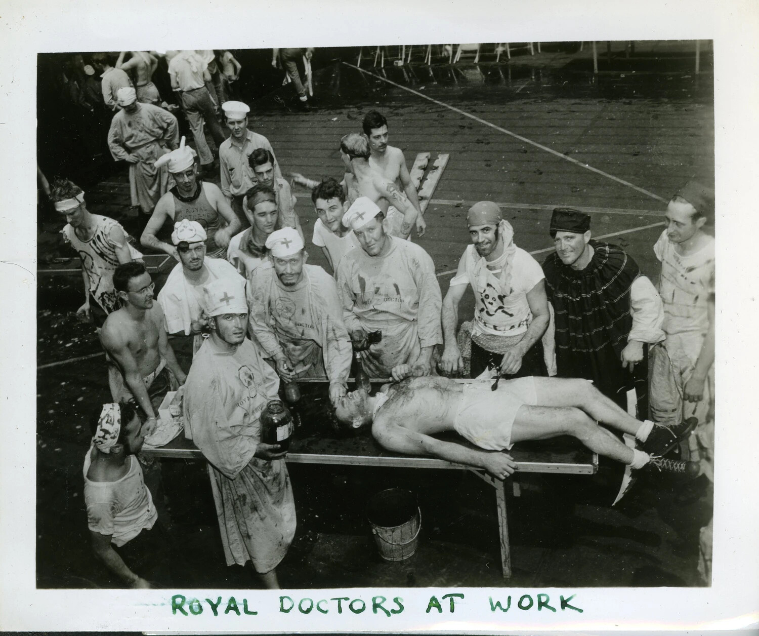 "Royal Doctors at Work" - King Neptune Equator-Crossing Ceremony, USS Franklin D. Roosevelt (CVB-42)