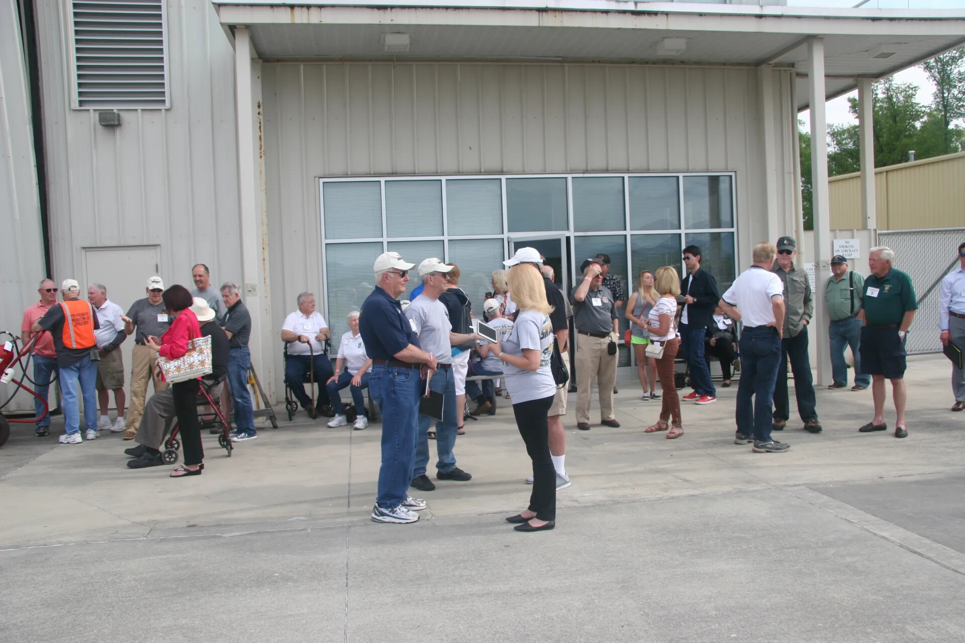Veterans and Family Gather Outside Aviation Museum Hangar, Operation Tailwind Reunion, April 2016