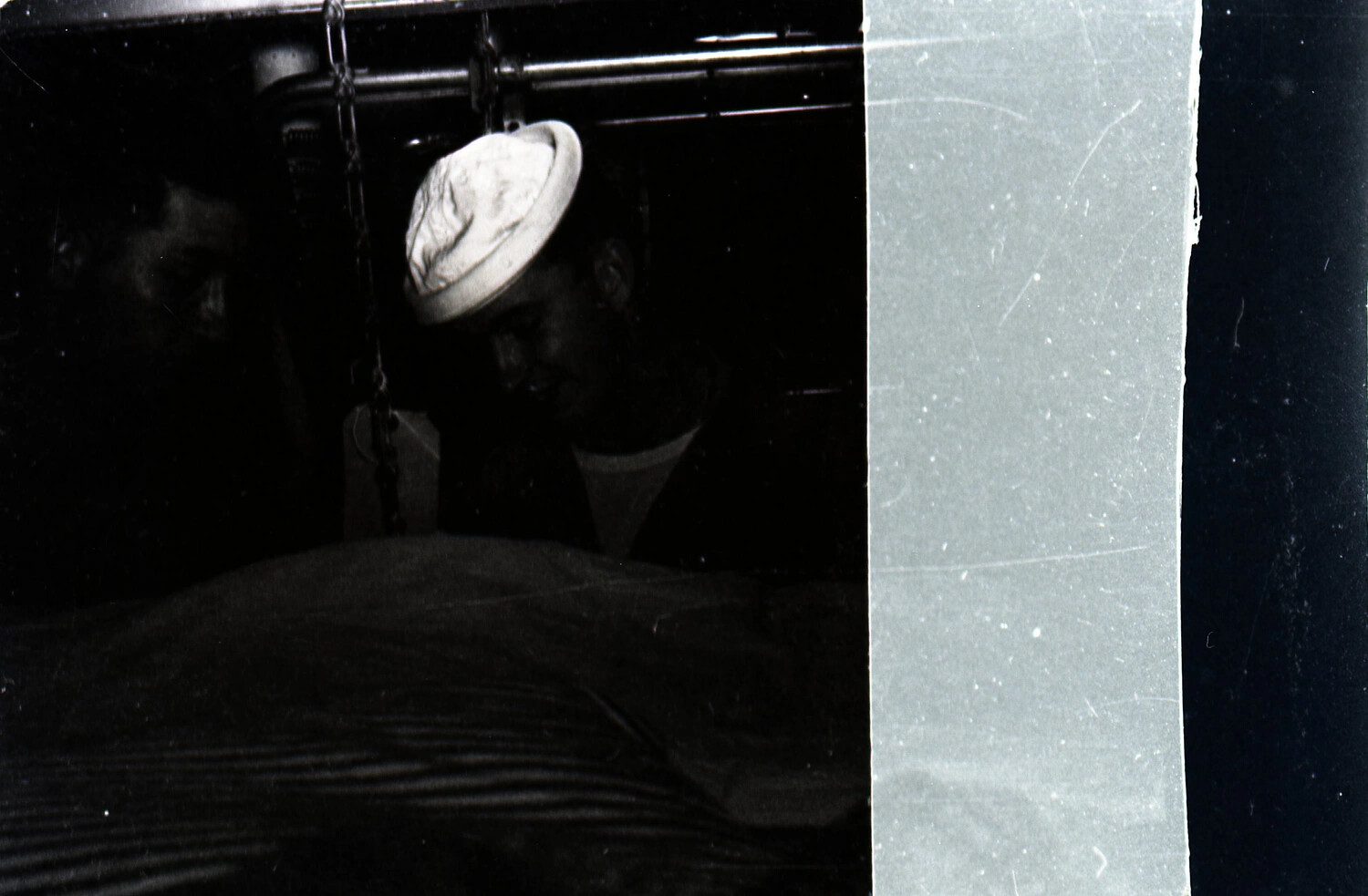 Sailor Below Decks Aboard USS Yorktown (CV-10), 1953 (Damaged Frame)