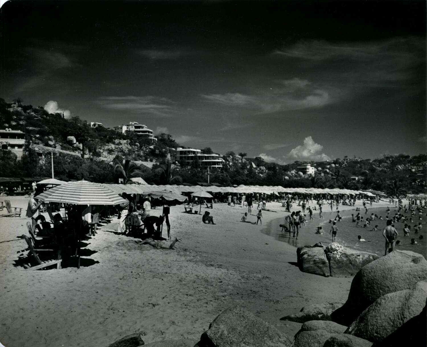 Beachfront Panorama with Umbrellas and Hillside Hotels, Acapulco, 1949