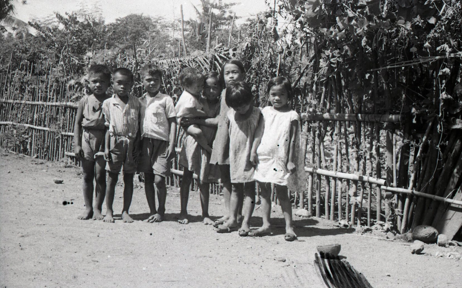 Group of Filipino Children in Barrio, Luzon, Philippines, World War II Era