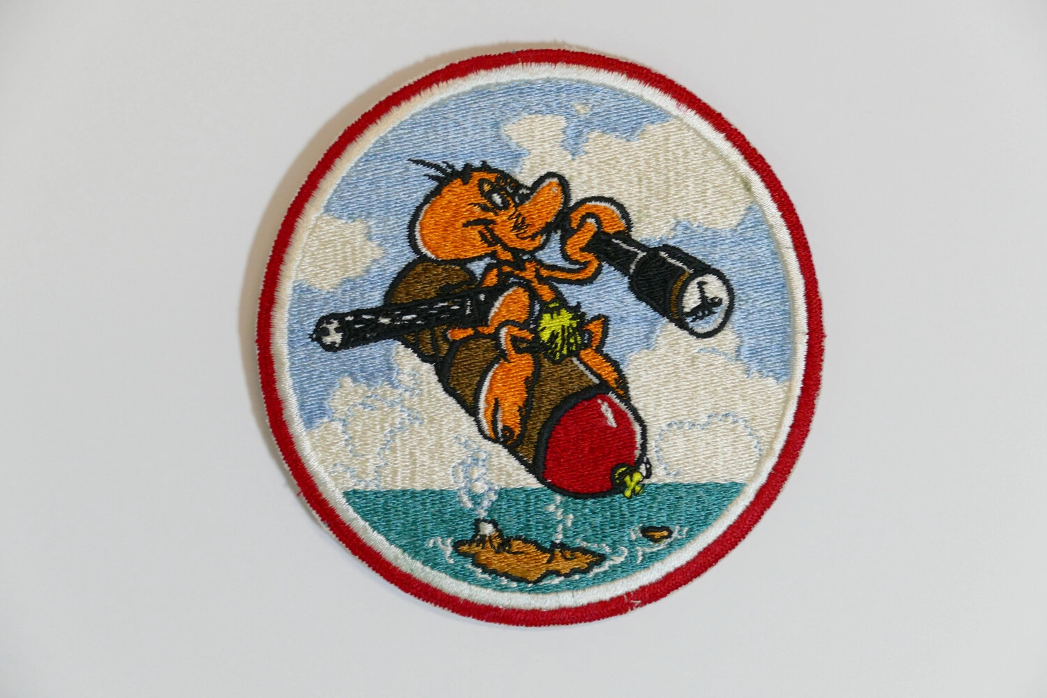 Navy Squadron Insignia Patch: Cartoon Aviator Riding a Bomb
