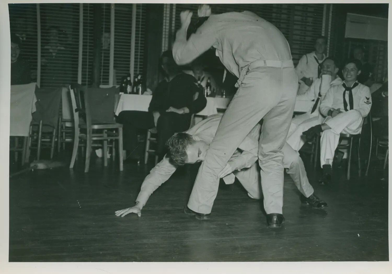 Sailors' Horseplay at a Liberty Party, USS Petrof Bay (CVE-80) Collection, WWII Era