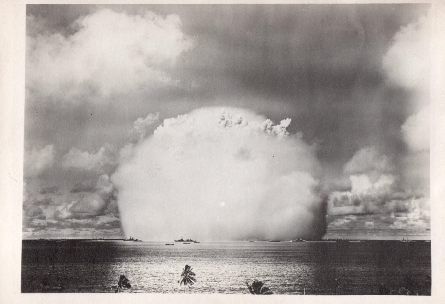Atomic Bomb Test Cloud Viewed from Shoreline, Bikini Atoll Lagoon, with Target Fleet