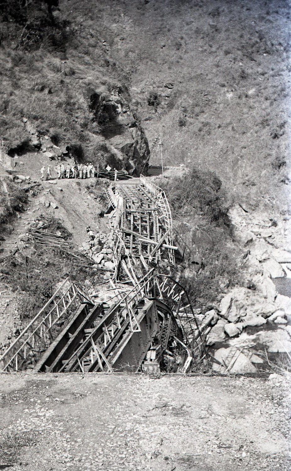 Soldiers Gathered at Approach to Destroyed Bridge, Luzon, Philippines, World War II
