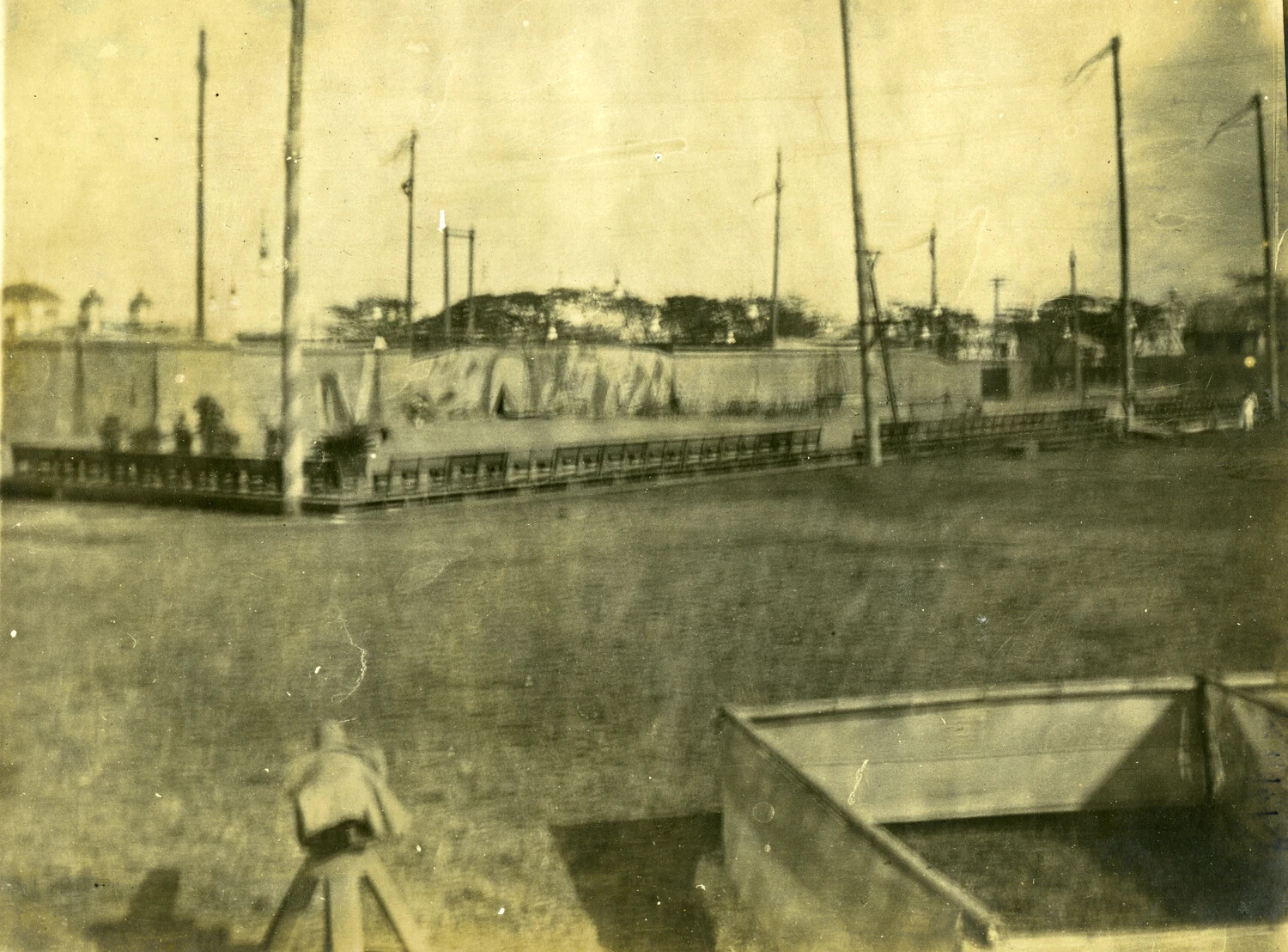 Waterfront Scene with Moored Vessel or Pier and Flagpoles, Philippines, Early 1900s